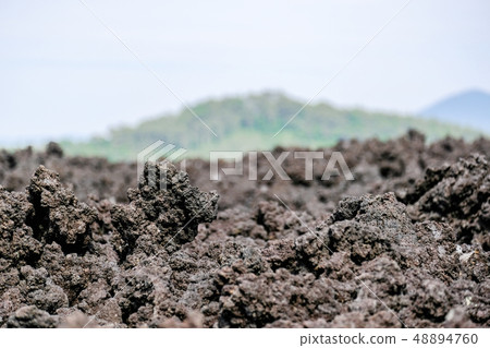 Cold and solidified lava Cold and solidified lava 48894760
