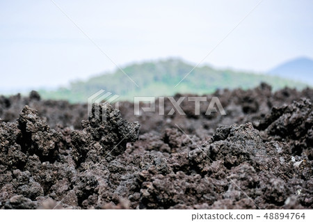 Cold and solidified lava Cold and solidified lava 48894764