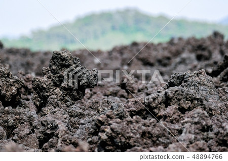 Cold and solidified lava Cold and solidified lava 48894766
