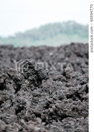 Cold and solidified lava Cold and solidified lava 48894770