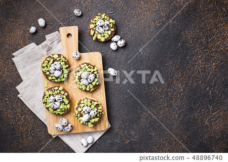 Easter cookies in shape of nest with eggs Easter cookies in shape of nest with eggs 48896740