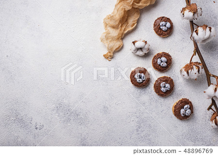 Easter  cookies in shape of nest with eggs 48896769