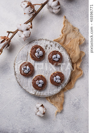 Easter cookies in shape of nest with eggs Easter cookies in shape of nest with eggs 48896771