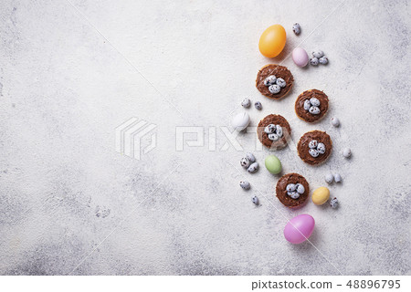 Easter cookies in shape of nest with eggs Easter cookies in shape of nest with eggs 48896795