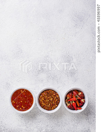 Chili sauce with dried peppers 48896997