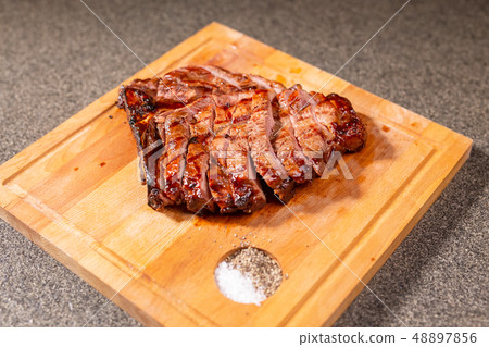Food, delicious, horse meat and craft concept - serving of grilled steak 48897856
