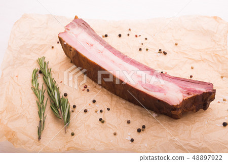Food, meat and delicious concept - horse meat with pepper, top view 48897922