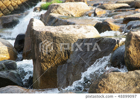 Jade stone and water flow in the river ... Aperture value: F7.1, shutter speed: 1/250, ISO speed: 400 Jade stone and water flow in the river ... Aperture value: F7.1, shutter speed: 1/250, ISO speed: 400 48899097