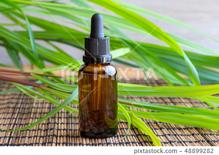 A bottle of lemon grass essential oil A bottle of lemon grass essential oil 48899282