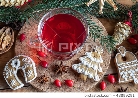 Rose hip tea with Christmas gingerbread cookies 48899291