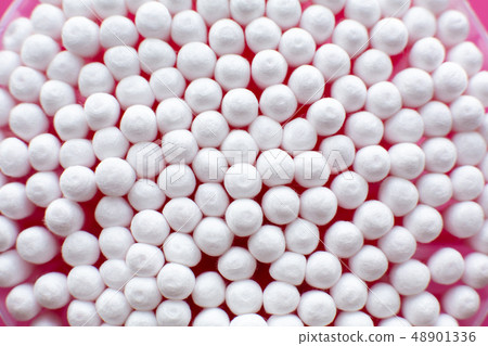 Closeup view from above on round pack of cotton Closeup view from above on round pack of cotton 48901336