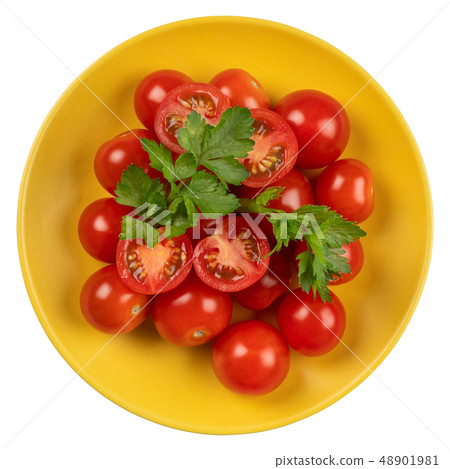 Tomatoes in a yellow plate 48901981