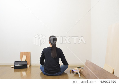 Thinking woman at DIY workplace Thinking woman at DIY workplace 48903159