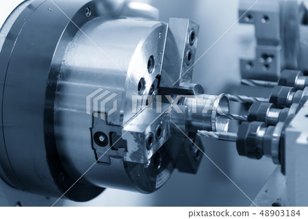 The CNC lathe machine . The CNC lathe machine . 48903184