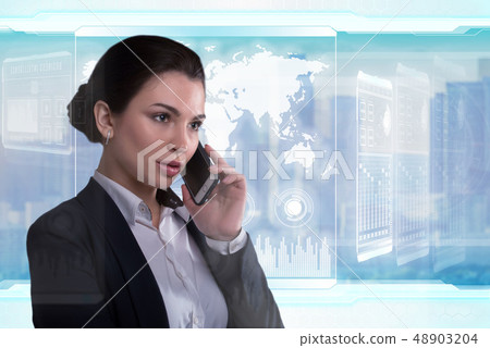Young business lady speaks on the phone and works in futuristic office 48903204
