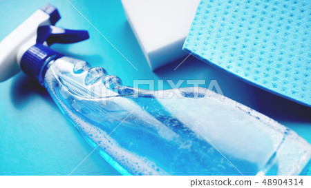Housework, housekeeping and household concept - cleaning rag, detergent spray 48904314