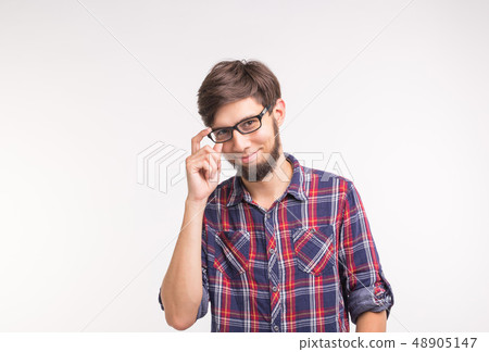 Expression and gesture concept - Surprised man looking at the camera on white background Expression and gesture concept - Surprised man looking at the camera on white background 48905147
