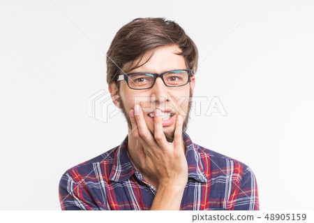 Expression and gesture concept - Handsome man with awkward face Expression and gesture concept - Handsome man with awkward face 48905159
