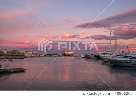 sunrise at the Valencia harbor, Spain Sunset at the port of Valencia, Spain sunrise at the Valencia harbor, Spain Sunset at the port of Valencia, Spain 48906263