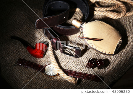 Men's casual business and recreation accessories on wooden table. 48906280