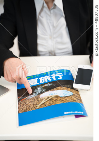 Woman, travel information (fictional magazine) Woman, travel information (fictional magazine) 48907338