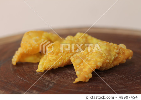 Fried dumplings,chinese food on wooden table. 48907454