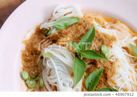 boiled Thai rice vermicelli, usually eaten with boiled Thai rice vermicelli, usually eaten with 48907912