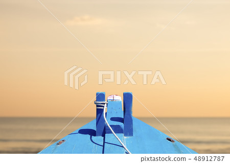 boat in the tropical sea sunset. 48912787