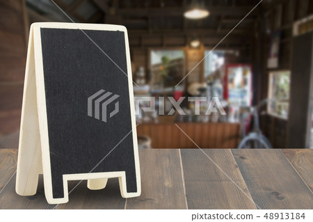 menu board on wooden top table. menu board on wooden top table. 48913184