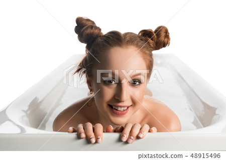 Pretty nude girl in foam bath isolated view Pretty nude girl in foam bath isolated view 48915496