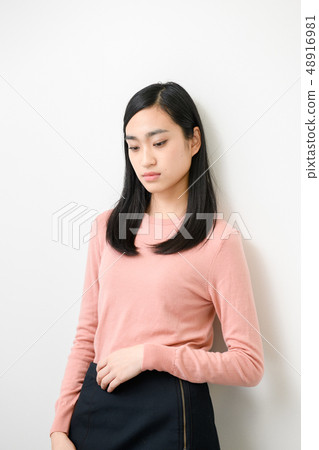 Plain background female model Plain background female model 48916981
