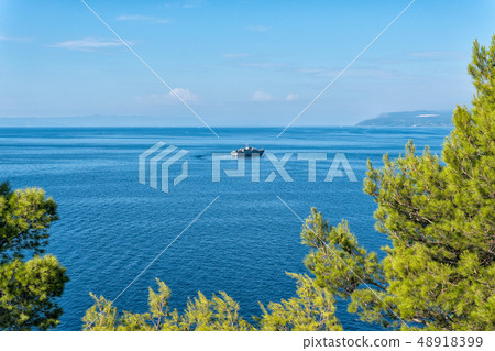 warship in the calm Mediterranean sea in the morning 48918399
