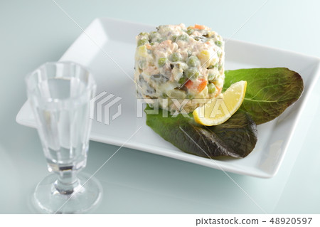 Russian salad with pink salmon and vegetables 48920597
