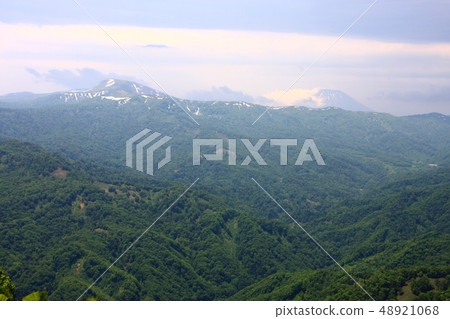 Mt. Yotei and Hitonenezan in the early summer seen from Jozankei Tenshodake 48921068