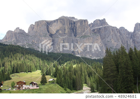 Dolomiti Massif and Tyrolian House 48924681