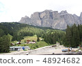Dolomiti Massif and Tyrolean House and Construction Site 48924682