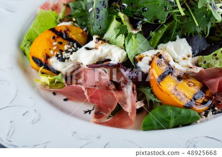 A liver of a guinea fowl with vegetables, in sauce 48925668