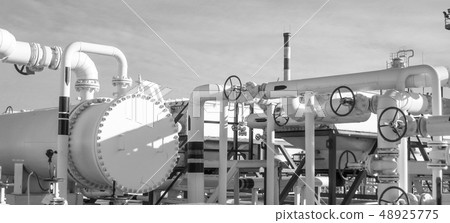Heat exchangers in a refinery. 48925775