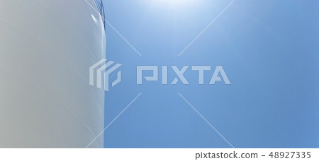 White tank in the sun. White tank in the sun. 48927335