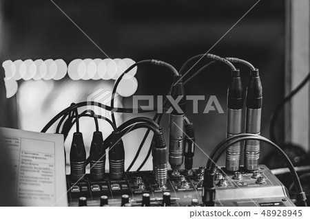 Mixing console at the concert Mixing console at the concert 48928945