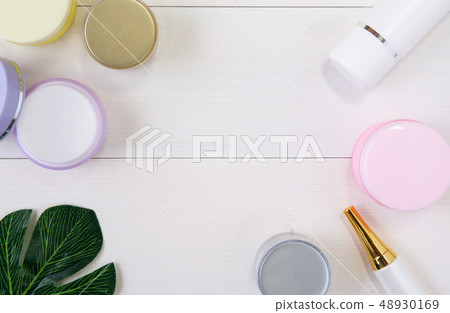 cosmetic and skin care product and green leaves cosmetic and skin care product and green leaves 48930169