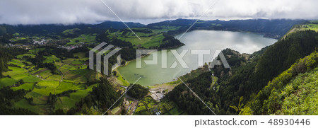 Panoramic landscape with aerial view on beautiful blue green crater lake Lagoa das Furnas and Panoramic landscape with aerial view on beautiful blue green crater lake Lagoa das Furnas and 48930446