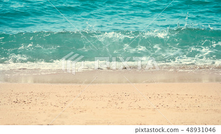 Clear light blue color sea water splashing to 48931046