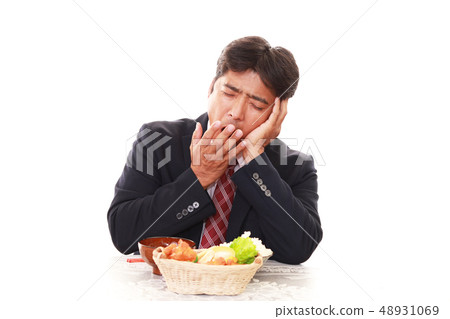 A man with a tired expression A man with a tired expression 48931069