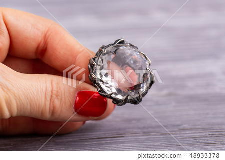 Mountain crystal in a silver facet Mountain crystal in a silver facet 48933378