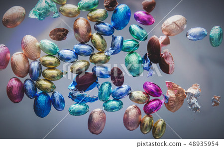 Easter holiday chocolate eggs on glass 48935954