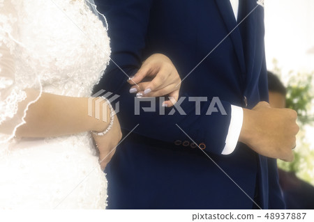 Beautiful Bride and Groom Couple Holding Together Beautiful Bride and Groom Couple Holding Together 48937887