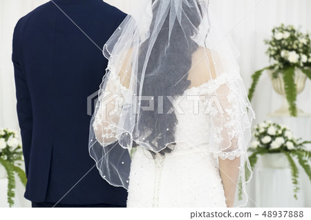 Beautiful Bride and Groom Couple Holding Together Beautiful Bride and Groom Couple Holding Together 48937888