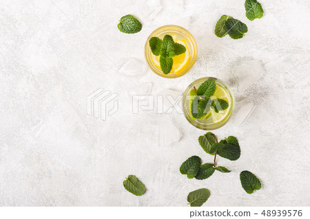 Lemonade or Mojito cocktail with mint and ice 48939576