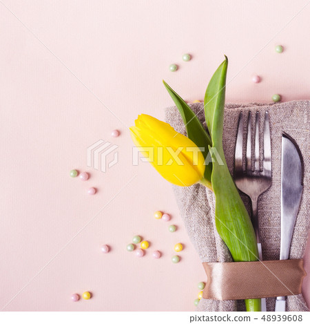 Spring Easter table setting. Cutlery is decorated 48939608